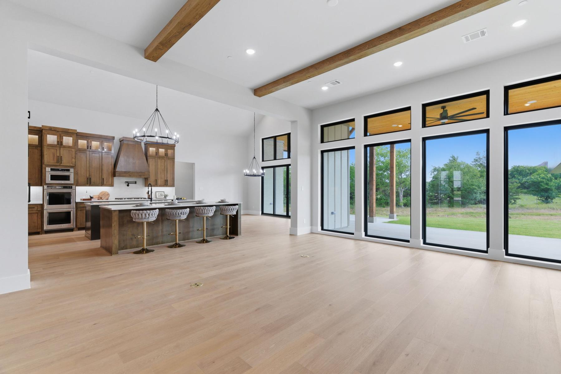 Custom kitchen dual island with chandelier